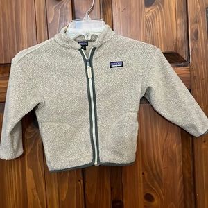 Patagonia toddler fleece 3T in beige.  Used has Childs name stamped on tag.